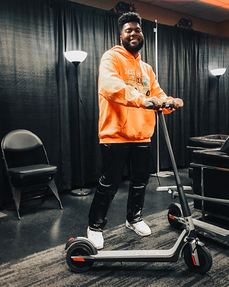 Khalid with Unagi Scooter